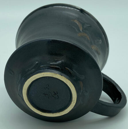 bottom of black mug